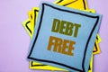 Writing text showing Debt Free. Business photo showcasing Credit Money Financial Sign Freedom From Loan Mortage written on sticky