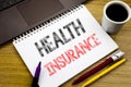 Writing text showing Health Insurance. Business concept for Medical Healthcare written on notebook book on the wooden background i Royalty Free Stock Photo