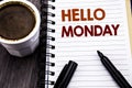 Writing text showing Hello Monday. Business concept for Day Week Start written on notebook book note paper on the wooden wood back Royalty Free Stock Photo