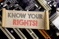 Writing text showing Know Your Rights. Business concept for Justice Education Written on sticky note, computer main board backgrou Royalty Free Stock Photo