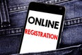 Writing text showing Online Registration. Business concept for Internet Login written mobile cell phone with copy space in the bac