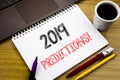 Writing text showing 2019 Predictions. Business concept for Forecast Predictive written on notebook book on the wooden background Royalty Free Stock Photo