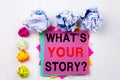 Writing text showing Question What Is Your Story written on sticky note in office with paper balls. Business concept for Sha Royalty Free Stock Photo