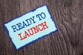 Writing text showing Ready To Launch. Business photo showcasing Prepare New Product Promotion Start Release written on Blue Stick