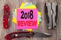 Writing text showing 2018 Review. Business concept for Feedback On Progress Written on sticky note wooden background with pocket k