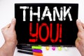 Writing text showing Thank You made in the office with surroundings such as laptop, marker, pen. Business concept for Giving Grati Royalty Free Stock Photo