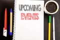 Writing text showing Upcoming Events. Business concept for Appointment Agenda List Written on notepad note paper background with s