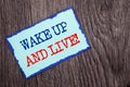 Writing text showing Wake Up And Live. Business photo showcasing Motivational Success Dream Live Life Challenge written on Blue S