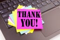 Writing Thank You text made in the office close-up on laptop computer keyboard. Business concept for Giving Gratitude Appreciate M