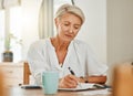 Writing, thinking and senior woman at a house making notes on notebook paper. Retirement of a serious person from Sweden Royalty Free Stock Photo