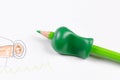 Writing tool for help by incorrect holding of pencil Royalty Free Stock Photo