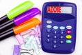 Writing word ADOBE text in the office with surroundings such as marker, pen writing on calculator. Business concept for Software C