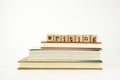 Writing word on wood stamps and books