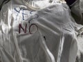 Writing Yes and No on T-Shirt with Ink Royalty Free Stock Photo