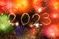 2023 happy new year firework banner. Sparks, fireworks and sparklers on black night sky as a holiday background Royalty Free Stock Photo