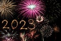 2023 happy new year firework banner. Sparks, fireworks and sparklers on black night sky as a holiday background Royalty Free Stock Photo