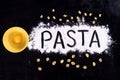 On written flour pasta. Broken egg. Spilling pasta. Royalty Free Stock Photo