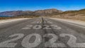 2022-2027 written on highway road to the mountain