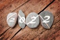 2022 written on a lign of stones on wood background Royalty Free Stock Photo