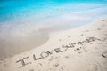 Written message on sand of a tropical beach `I love summer`, Crete. Royalty Free Stock Photo