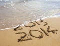 2013 and 2014 written on Sand Royalty Free Stock Photo