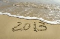 2012 and 2013 written in sand Royalty Free Stock Photo
