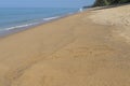 2033 written in the sand on the beach - Happy New Year written in the sand on the beach - Happy New Year