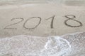 2018 written on the sand of a beach Royalty Free Stock Photo