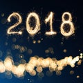 2018 written with Sparkle firework on black background , 2018 Ha Royalty Free Stock Photo