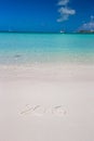 2016 written on tropical beach white sand with Royalty Free Stock Photo