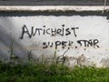Written on a wall ANTICHRIST SUPERSTAR Royalty Free Stock Photo