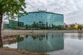 WrocÃâaw hotel Park Plaza on the Oder River with swans swimming