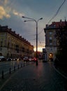 Wroclaw city sunset over the street behind clouds