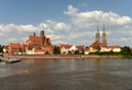 Wroclaw cityscape with Church of the Holy Cross and St. Bartholomew and Cathedral of St John the Baptist with river Odra in
