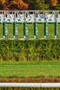 Wroclaw, horse racing track, starting gates for horses, autumn landscape with colorful trees on a sunny day Royalty Free Stock Photo