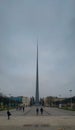 Wroclaw Iglica statue on brick square at cloudy day