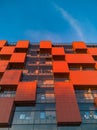 Facade of pixel house building at sunset