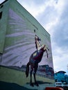 Mural street art with colorful horse as ad of WrocÃâaw Horse Race Track Partynice