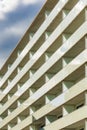 Perspective view to facade of modern building of new estate with glass balconies Royalty Free Stock Photo