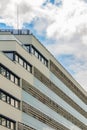 Perspective view to facade of modern building of new estate with glass balconies Royalty Free Stock Photo