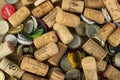 Metal Beer Caps and Assorted Wine Corks Background Texture Royalty Free Stock Photo
