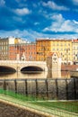 Renovated old Pomorski bridge at city center over Odra river with view to barrage with falling