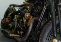 WROCLAW, POLAND - August 11, 2019: USA cars show: Fragment of vintage stylish black and copper coloured engine with exhaust