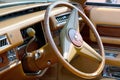 Wroclaw, Poland, August 22, 2021: Wooden steering wheel of an old Chrysler car. Royalty Free Stock Photo