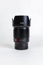 Wroclaw, Poland - December 19 2023: Camera lens for mirrorless Canon camera with RF mount Viltrox RF 85mm f1.8 STM on white