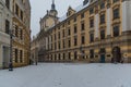 University square with facade of Wroclaw University building and fountain at the center of it