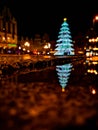 Wroclaw market square at night with some of walking people, glowing lanterns and beautifully and Royalty Free Stock Photo