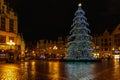 Wroclaw market square at night with some of walking people, glowing lanterns and beautifully and Royalty Free Stock Photo