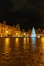 Wroclaw market square at night with some of walking people, glowing lanterns and beautifully and Royalty Free Stock Photo