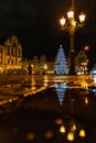 Wroclaw market square at night with some of walking people, glowing lanterns and beautifully and Royalty Free Stock Photo